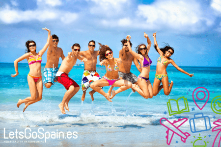 Happy students at the beach enjoying their internship in Spain.