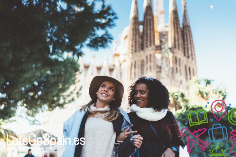 Happy students near the Sagrada Família in Barcelona, Spain during an internship